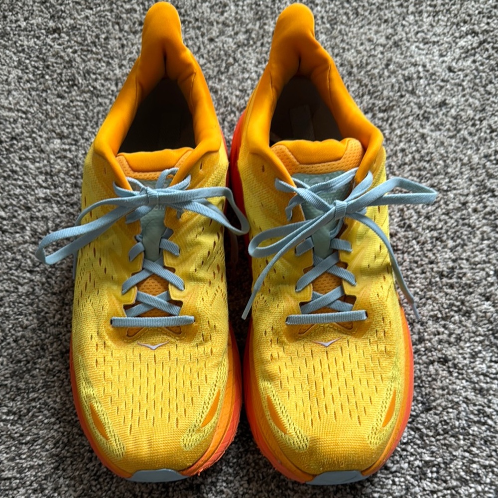 Hoka Clifton 8 Yellow and Orange Running Shoes with gray Laces